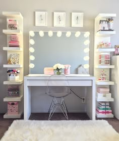 a white desk with a mirror and lights on it