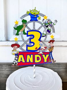 there is a birthday cake with the number three on it and characters from toy story