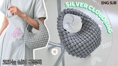 a woman is holding a crocheted purse in front of a circular object with the words silverclouds on it