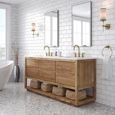 a bathroom with two sinks and a bathtub