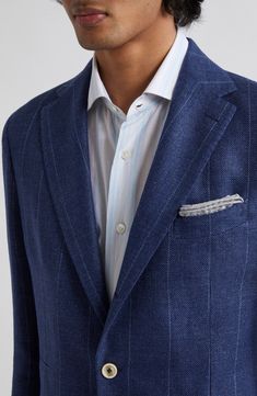 Rich fabric crafted from linen, wool and silk brings soft freshness to a masterfully tailored suit designed to mimic the appearance of pinstriped denim. Jacket has notched lapels; chest welt pocket; front flap pockets Trousers have zip fly with hook-and-bar closure; front slant pockets; back welt pockets Jacket is lined; trousers are lined to the knee 74% linen, 24% wool, 2% silk Dry clean Made in Italy Designer Clothing Tailored Pinstripe Blazer With Pockets, Elegant Striped Outerwear With Pockets, Elegant Striped Blazer With Pockets, Semi-formal Striped Sport Coat With Notch Lapel, Pinstripe Notch Lapel Blazer, Striped Notch Lapel Suits For Spring, Tailored Striped Linen Blazer, Pinstripe Linen Blazer With Notch Lapel, Pinstripe Blazer With Pockets For Formal Occasions