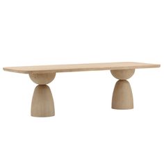 a wooden table with three legs and two small round bases on each end, against a white background