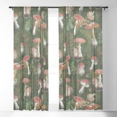 a curtain with mushrooms and leaves on it