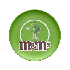 a green plate with the m & m's logo on it and an image of a cartoon character