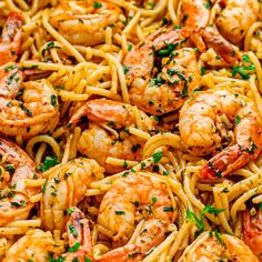 pasta with shrimp and parsley in a pan