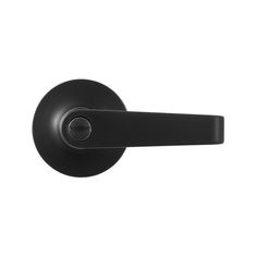 a black door handle on a white wall