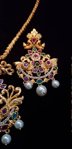 "Handmade Indian Temple Jewelry, best to wear it for traditional ceremonies or Indian wedding. This bridal jewelry has ethnic finish. It has Cubic Zircon stones with ruby and emeralds. It is a Bollywood style one gram jewelry. There are long and short patterns of Indian jewelry in Kundan, Pearls, CZ, American Diamond , ruby, emerald, Polki, kemp to suit every occasion of South Indian and North Indian weddings. Handmade Indian Jewelry item * Stunning Hand made matt finish traditional jewelry set. Peacock Design Pendant Jewelry For Wedding, Traditional Ruby Pendant Necklace, Traditional Jeweled Bridal Necklace For Diwali, Traditional Bridal Necklace With Stone Setting For Festive Occasions, Festive Traditional Bridal Necklace With Stone Setting, Kundan Necklaces For Traditional Ceremonies, Traditional Chandbali Bridal Necklace With Stone Setting, Traditional Temple Necklace With Stone Setting For Festive Occasions, Traditional Temple Necklace With Stone Setting For Wedding