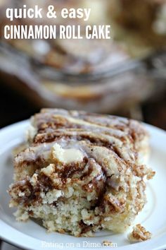 cinnamon roll cake on a white plate with the words quick and easy cinnamon roll cake