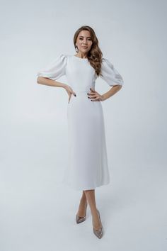 Fabric: Crepe Viscose 50%, Polyester 40%, Elastane 10% Round neckline Puff sleeves Short sleeves Zipper on back Midi length Satin Midi Dress With Sleeves, Graduation Dress 2023, Elegant Graduation Dress, Puff Sleeve Midi Dress, Puff Sleeve Dresses, Satin Mini Dress, Sleeve Midi Dress, White Midi Dress, Casual Summer Dresses