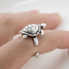 • Handcrafted Wrap Rings – Wear Felicity turtle wrap ring are carefully designed by jewelry artists to ensure they’re stylish and durable. They’re the perfect addition for animal lovers everywhere.• Classic, Intricate Detailing – Each small wrapped ring features the “turtle”, a turtle that is peering over your finger to remind you how much he loves you! • Wonderful Gift Choice – Animal wrap rings make a great birthday, anniversary, holiday, or “just because” gift for special women and girls in y Christmas Rings Jewelry, Christmas Rings, Deer Rings, Rose Gold Bridal Jewelry, Animal Themed Jewelry, Turtle Ring, Silver Wrap Ring, Animal Ring, Sterling Silver Jewelry Rings