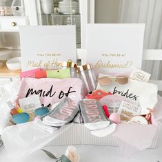 the bridesmaid gift box is filled with personalized items for her special day