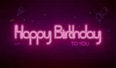 happy birthday to you neon sign on brick wall