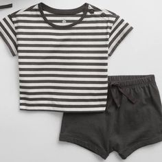 Baby Gap Soft Black Three-Piece Outfit Set 3-6 Months Nwt Straight, Easy Fit. Easy Pull-On Waist. Soft Cotton Knit. Bucket Hat Has Stitching At Brim, Hook And Loop Strap At Chin. Dropped Shoulder With Buttons, Short Sleeves. Crewneck. Elasticized Waistband. Upf 50+: Excellent Uv Protection. Gray Summer Playwear For Babies, Gap Cotton Summer Sets, Summer Casual Sets By Gap, Casual Summer Sets By Gap, Casual Summer Sets From Gap, Casual Gap Playwear Sets, Gap Casual Playwear Sets, Knit Bucket Hat, Gap Outfits