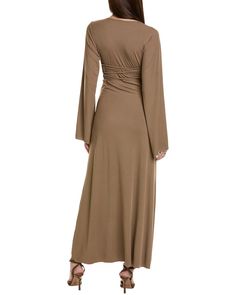 Color/Pattern: Khaki Approximately 56In From Shoulder To Hem Model Is 5'11 And Is Wearing A Size Small. Measurements May Vary Slightly By Size. Design Details: Wide Sleeves, Lace-Up Back Tie Slip-On Styling 60% Polyester, 40% Spandex Hand Wash Imported Brown Stretch Long Sleeve Maxi Dress, Beige Stretch V-neck Maxi Dress, Beige Stretch Maxi Dress With V-neck, Stretch Ruched Maxi Dress For Fall, Fall Stretch Ruched Maxi Dress, Brown Fitted Long Sleeve Maxi Dress, Spring Brown Stretch Maxi Dress, Spring Stretch Brown Maxi Dress, Brown Stretch Maxi Dress For Fall