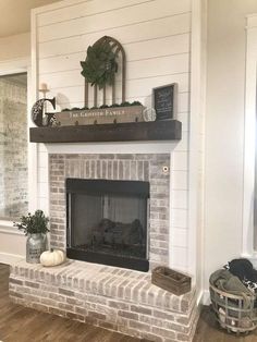 a living room filled with furniture and a fire place