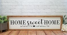 a wooden sign that says home sweet home