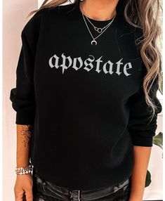 Apostate and proud! Whatever it is you've apostatized from - wear the label with pride. This sweatshirt also makes a perfect gift for a fellow heathen! Gildan sweatshirts are UNISEX SIZES and have a traditional, loose fit. Size up for that trendy oversized look! Medium-heavy fabric gives this sweatshirt beautiful drape and body. We recommend laying a favorite top flat and measuring it before ordering to get the perfect fit. PLEASE WASH BEFORE WEARING - items may feel slightly stiff when you rece Emo Gifts, Bohemian Grunge, Sinful Clothing, Anti Religion, Gildan Sweatshirts, Graphic Tops, Goth Outfits, Edgy Outfits, Mom Outfits