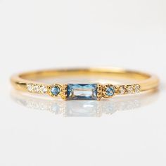 Calming Blue Stacking Ring | Local Eclectic – local eclectic Blue And Gold Rings, Aquamarine Wedding Band, Stackable Gemstone Rings, Birthstone Band, March Birthstone Ring, Gemstone Diamond Ring, Blue Diamond Ring, Sapphire Band, London Blue Topaz Ring