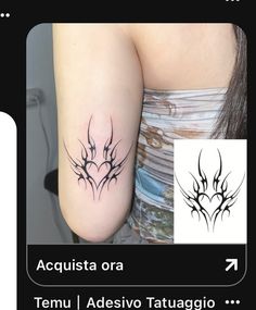 an image of a tattoo on someone's arm with the words acquisita ora