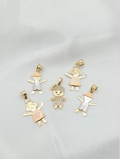 Children's 14K Solid Gold Pendants. A Perfect and Valuable Gift For Baby Shower, Birthday, Christmas & Baby Born Visits!  Please find your favorite style Hat Boy, Happy Girl, and Little Cute Girl in the photons.  Hat Boy Gram Weight: 0.80gr / Pendant Length: 22 mm Happy Girl Gram Weight: 1.20gr / Pendant Length: 25 mm Little Cute Girl  Gram Weight: 1.11gr / Pendant Length: 22 mm ALL MY JWELERIES ARE MADE OF HIGH QUALITY SOLID GOLD MATERIAL ONLY AND I DO NOT CARRY ANY ''GOLD PLATED'' ITEMS.  * 14K gold will be marked with a number such as 585, or 14K stamp denoting that the jewelry contains 58.5% gold (or 585 parts per thousand). * We are pleased to offer complimentary delivery within the Canada and US. * Your order will be ready for shipment in 1-3 business days. * All our creations are ca Gold Pendants, Baby Jewelry, Precious Jewels, Happy Girl, Baby Born, Baby Birth, Star Pendant, Christmas Baby, Shower Gifts