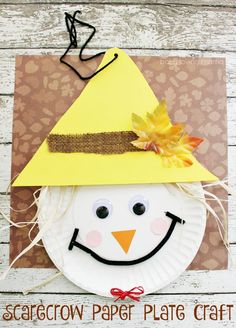 a paper plate snowman with a yellow hat on it's head and the words scarecrow paper plate craft