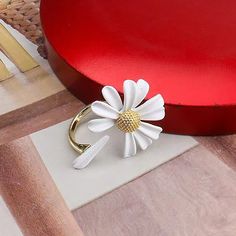 🌼 DAISY | Stunning pendant shaped like chrysanthemum, trendy cute floral design. Perfect for all flower lovers bridal occasions and birthday gifts!🌼 4 PIECE | Consists of 1 charm necklace, 1 bracelet, 1 pair of asymmetrical hypoallergenic stud earrings, and 1 ring. Spring is here in a matching classic 4-piece set!🌼 GOLD | Sterling silver with gold plating and white lacquered petals. Absolutely gorgeous for spring and summer seasons. Perfectly matching yellow, gold, and white combination for a White Jewelry For Spring Gifts, Trendy Flower Decorated Jewelry As Gift, Trendy Flower Decorated Jewelry Gift, Trendy Jewelry With Flower Decoration For Gift, Trendy Floral Jewelry For Gifts, Spring White Birth Flower Jewelry, Spring Flower Jewelry For Anniversary, White Flower Jewelry For Bridesmaid Gift, Spring Birth Flower Jewelry