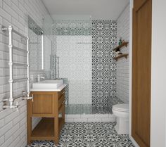 a white toilet sitting next to a sink in a bathroom under a shower head mounted faucet