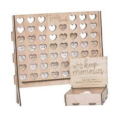 a wooden memory box with hearts on it