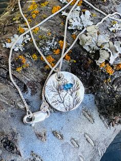 "Pendant is created with fine silver precious metal clay. All charms and findings are sterling silver, including the 18\" box chain.  Yarrow is a plant with special status. Thousands of years ago it was used in divination. Later, it was found that this plant also had medicinal effects. it grows wild and is found everywhere in Wallowa County! Your item will come gift box and with a small silver polishing cloth :)" Sterling Silver Nature-inspired Necklace For Anniversary, Nature-inspired Sterling Silver Necklace For Anniversary, Nature-inspired Engraved Sterling Silver Necklace, Nature-inspired Birthstone Pendant Necklace, Silver Birthstone Necklace With Birth Flower Pendant, Sterling Silver Necklaces For Jewelry Making With Birth Flower, Nature-inspired Sterling Silver Birth Flower Necklace, Artisan Silver Necklace With Birthstone, Artisan Silver Birthstone Necklace