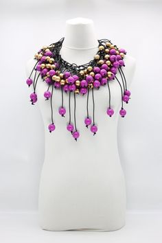 Description: Hand-woven leatherette Wooden beads cape-style necklace Length: Adjustable 45 to 55cm Available colours & Product codes: Hot Pink - NL2112-50Hot Pink/Gold - NL2112-5003Magenta - NL2112-41Magenta/Gold - NL2112-4103Turquoise - NL2112-13Turquoise/Gold - NL2112-1303Gold - NL2112-03Silver - NL2112-16Yellow - NL2112-40Yellow/Black - NL2112-4001White - NL2112-14White/Gold - NL2112-1403Black - NL2112-01Cobalt Blue - NL2112-35Cobalt Blue/Gold - NL2112-3503Orange - NL2112-12Spring Green - NL2 Gold And Magenta, Beaded Cape, Wooden Bead Necklaces, Cape Style, Fringe Necklace, Bib Necklace, Spring Green, Style Necklace, Beads Necklace