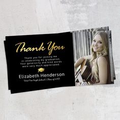 a black and gold graduation thank card with an image of a woman holding a guitar