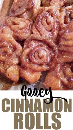 some cinnamon rolls are stacked on top of each other with the words glazey cinnamon rolls above them