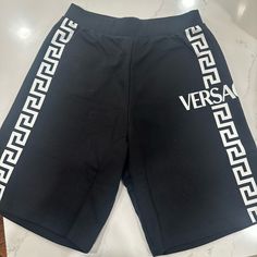 Black Boys Versace Shorts Authentic Size 12. New With Tags Casual Black Bottoms With Logo Waistband, Black Bottoms With Logo Waistband In Short Length, Black Bottoms With Logo Waistband, Short Length, Black Casual Shorts With Logo Waistband, Versace Pants, Versace Shorts, Baby Logo, Velvet Pants, Black Boys