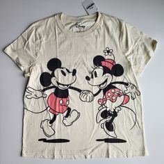 Disney X Primark Mickey & Minnie Shirt Womens Xl Off White Cream Color Short Sleeve Brand New With Tags Armpit To Armpit 25.5 Shoulder To Shoulder 18.5" Shoulder To Hem 26.5" Bundle And Save Spring Mickey Mouse Short Sleeve Top, Spring Cotton Mickey Mouse Top, Spring Mickey Mouse Cotton Top, Cotton Mickey Mouse Top With Relaxed Fit, Casual Minnie Mouse T-shirt For Spring, Spring Minnie Mouse Cotton T-shirt, Spring Cotton T-shirt With Minnie Mouse, Fun Cotton Minnie Mouse Top, Vintage Mickey Mouse Cotton Top