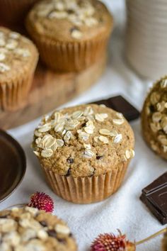 muffins with oats and chocolate on a table