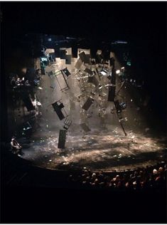 an aerial view of a stage with chairs and lights