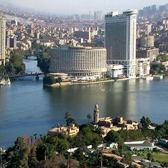 an aerial view of a city and the river