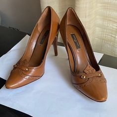 Louis Vuitton Brown Leather Pumps. Size 35.5 -5.5. 3.25” Heel Height. Made In Italy Shoes Louis Vuitton, Louis Vuitton Brown, Louis Vuitton Shoes, Leather Pumps, Brown Gold, Pumps Heels, Shoes Women Heels, Brown Leather, Heel Height