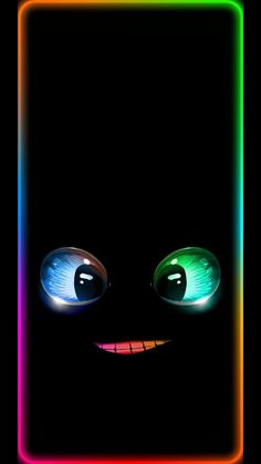 an image of the face of a cat with glowing eyes in neon colors on a black background