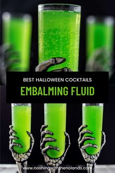 halloween cocktails with lime green liquid and skeleton hands on the rim, in front of a black background