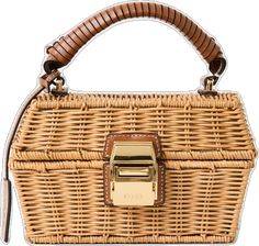 a wicker purse with a metal handle