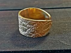 Modern anniversary ring made with 24K gold plated silver. I use only first quality materias for my jewelry. I made this ring by using the lost wax method. That means I make this piece in wax by hand carving it. Then I bring it to the foundry and I work with to have this cast. The ring is adjustable. * This item is made to order handcrafted and shipped by me, so it may take at least one week before shipping. You can contact me if you want something to arrive earlier, I will do my best. ** All my Silver Gold-plated Dome Ring For Anniversary, Gold Open Ring Hand Forged, Gold Hand Forged Open Ring, Gold Brass Dome Ring For Anniversary, Hand Forged Gold Open Ring, Hand-forged Gold Open Ring, Gold Hammered Ring Jewelry, Handmade Gold Plated Rings For Promise, Unique Hammered Rings With Thick Band