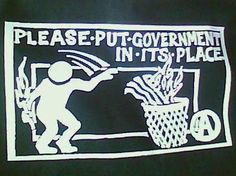 a sticker on the back of a jacket that says please put - government in it's place