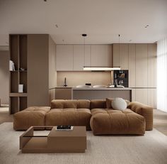 a living room filled with lots of furniture and a large brown couch in front of a window