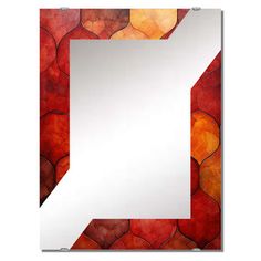 a mirror with an orange and red pattern on the back ground, in front of a white background