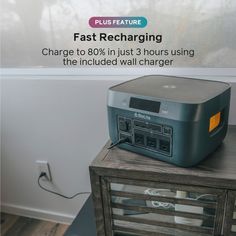 an old radio sitting on top of a wooden table next to a glass case with the words fast recharging charge to 80 % in just 3 hours using the included wall charger