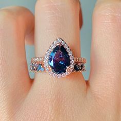 ✦Gorgeous London Blue Topaz Ring 2 Piece Set✦ ✧ Base Metal: 925 Sterling Silver ✧ Plating: 14K Rose Gold Vermeil ✧ Accented with Natural Crystals ✧ Average band width: 2.1 mm ✧ Center Stone: Topaz ✧ Color: London Blue ✧ Stone Cut: Pear ✧ Gem size: 8.0 x 6.0 mm ✧ Carat Weight: 1.21 ct. ✧ Gemstone creation: Natural ✧ Hardness: 8 (Mohs scale) ✧ Gemstone Origin: Switzerland ✧ Sizes 3.5-11.25 ✧ This ring set will arrive ready to gift in a Kherish Box. ✧ Due to the nature of the handmade process, each Rose Gold Blue Topaz Ring For Anniversary, Fine Jewelry Rose Gold Ring With Blue Topaz, Luxury Multi-stone Topaz Promise Ring, Rose Gold Blue Topaz Ring With Accent Stones, Rose Gold Blue Topaz Gemstone Ring, Rose Gold Blue Topaz Jewelry With Accent Stones, London Blue Topaz Ring Rose Gold, Elegant Blue Topaz Multi-stone Rings, Elegant Brilliant-cut Topaz Birthstone Ring