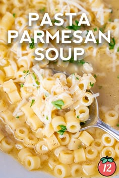 pasta parmesan soup in a white bowl with a spoon