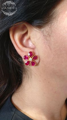 A gorgeous flower shape lab created Ruby and best 5A quality cubic zirconia stud earrings pair made in guaranteed Sterling Silver 925 (stamped) with real 18k gold filling, matte look, perfectly finished and made. Size of lab created ruby used is 8mm x 6mm, size of cubic zircon is 3.00 mm. Gold Filling is completely different from Gold Plating as gold filling contains 100% gold which does not go away easily and enhances the life and look of the jewelry. Plating we used is 100% LEAD & NICKEL FREE Gemstone Flower Earrings For Anniversary, Flower Studs Earrings, Star Ruby, Studs Earrings, Diamond Flower, Ruby Diamond, Flower Earrings Studs, Flower Studs, Flower Shape