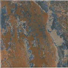 an old rusty surface with blue and brown paint